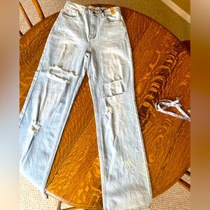 Light Wash Distressed Jeans Size: 27